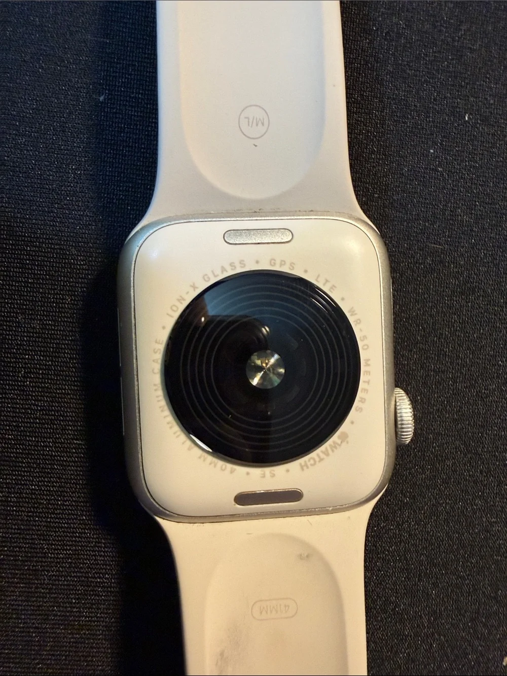 Smartwatch with Tan Silicone Band and Magnetic Charger
